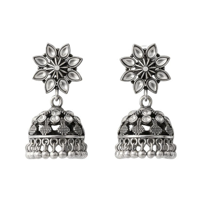 flower-shaped top with petal-like white stones