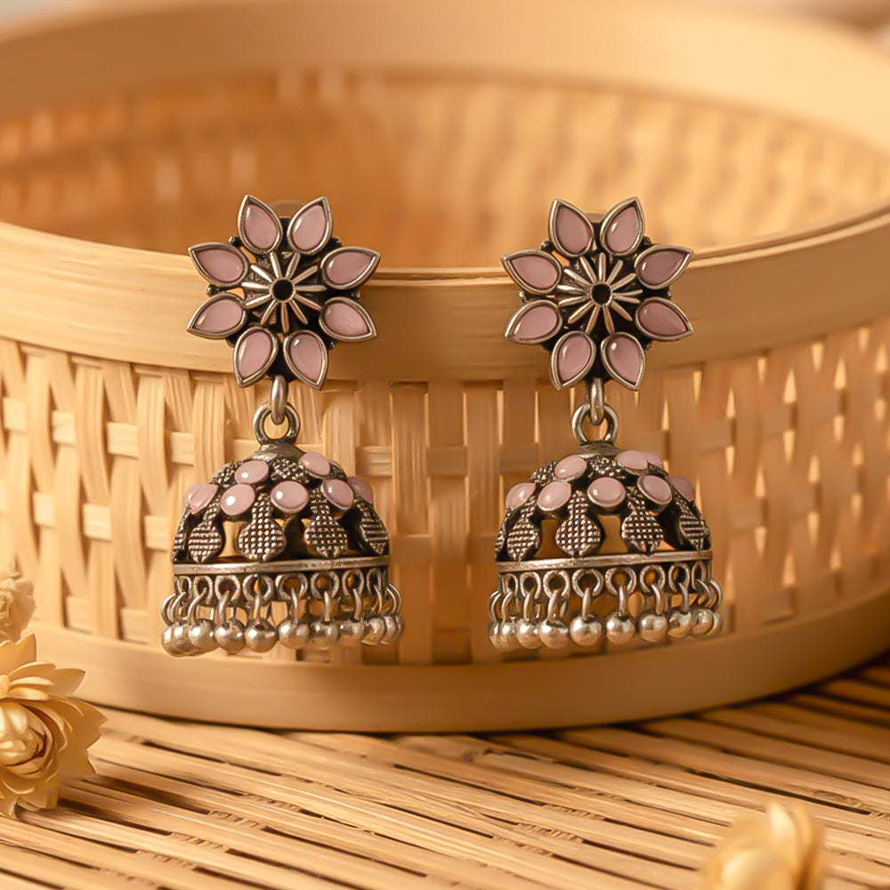 flower-shaped top with petal-like Baby pink stones