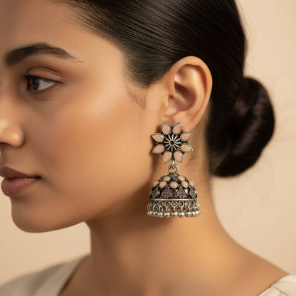 flower-shaped top with petal-like light Orange stones