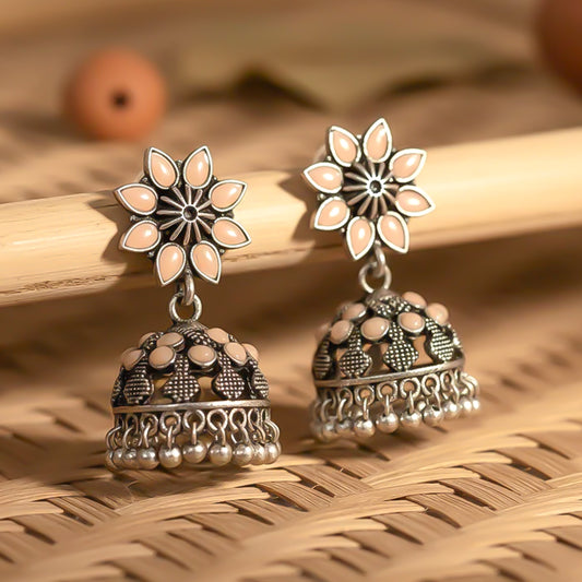 flower-shaped top with petal-like light Orange stones