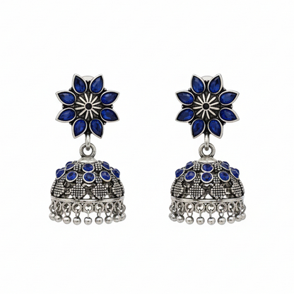 flower-shaped top with petal-like blue stones
