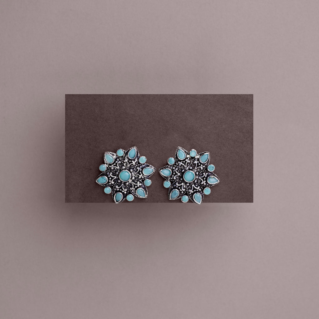Mint Stone Studded Star Shaped German Silver Stud Earrings