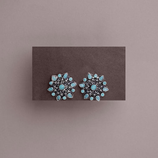 Mint Stone Studded Star Shaped German Silver Stud Earrings