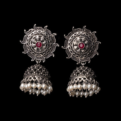 Red Stone Studded German Silver Statement Earrings With Brass Jhumki