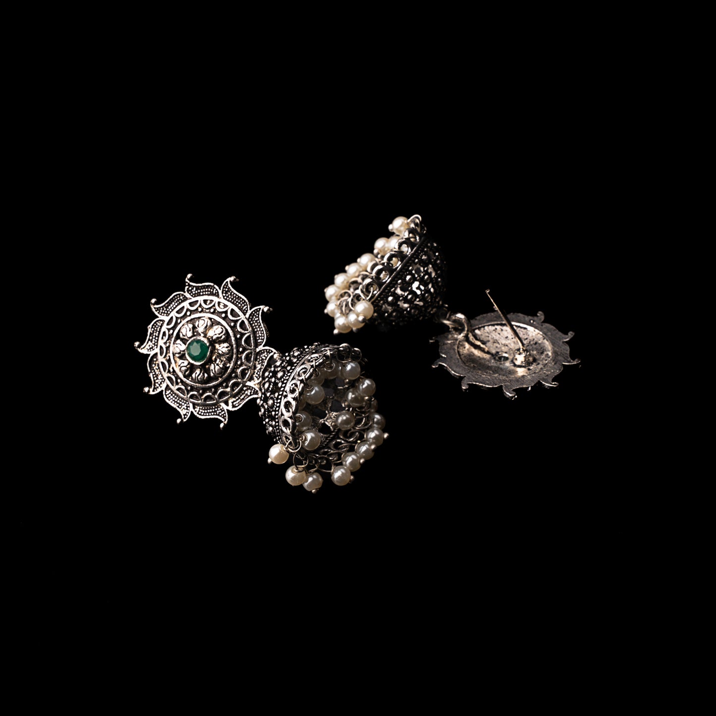 Green Stone Studded German Silver Statement Earrings With Brass Jhumki