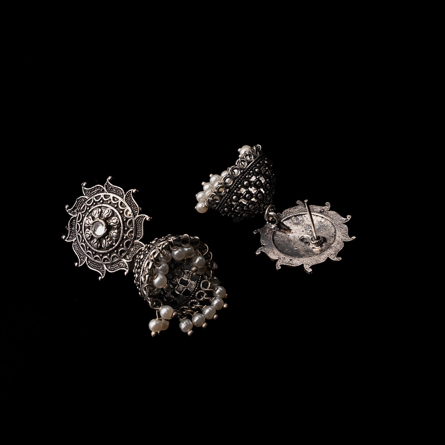 White Stone Studded German Silver Statement Earrings With Brass Jhumki