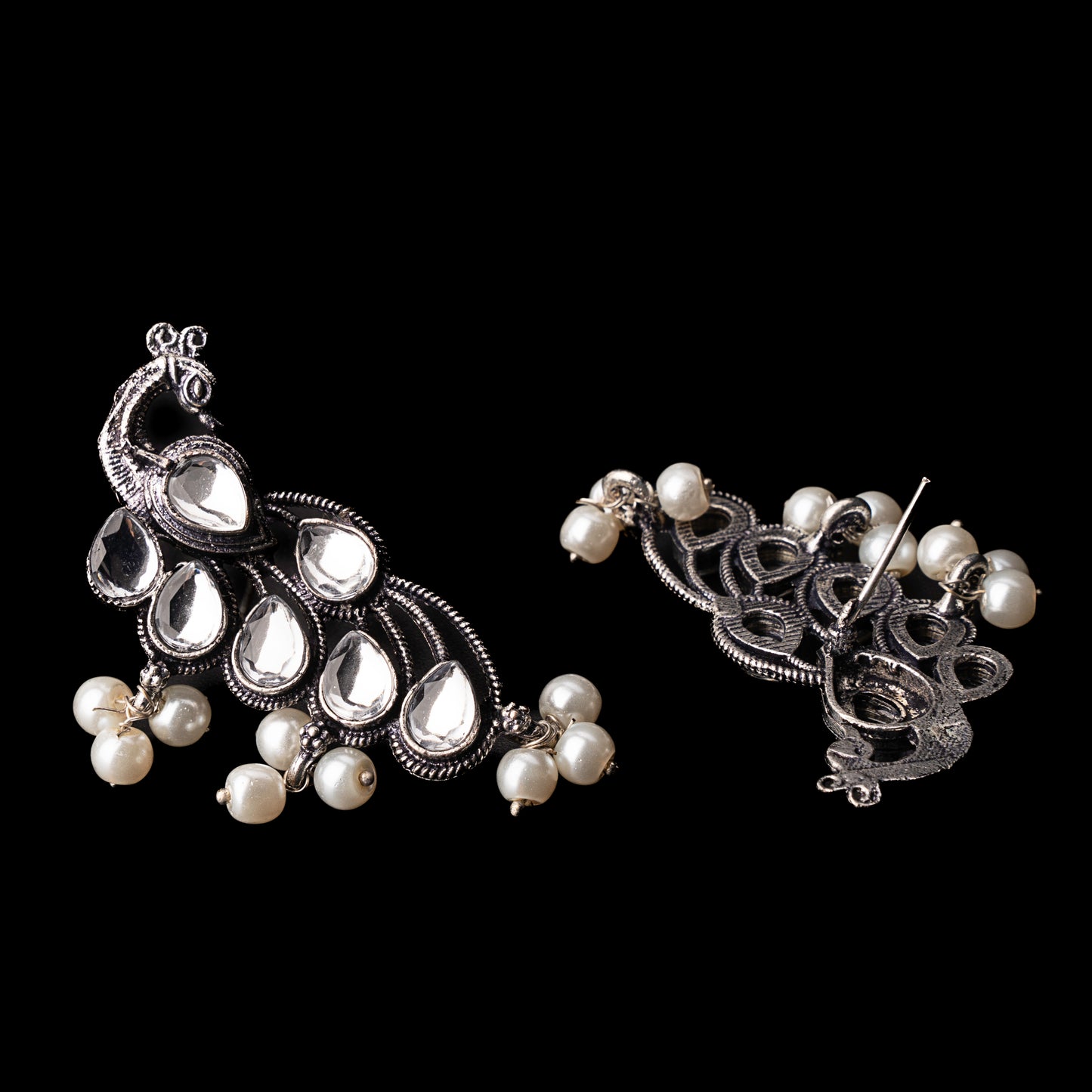 White Stone Studded Peacock Shaped Earrings With Hanging Pearls