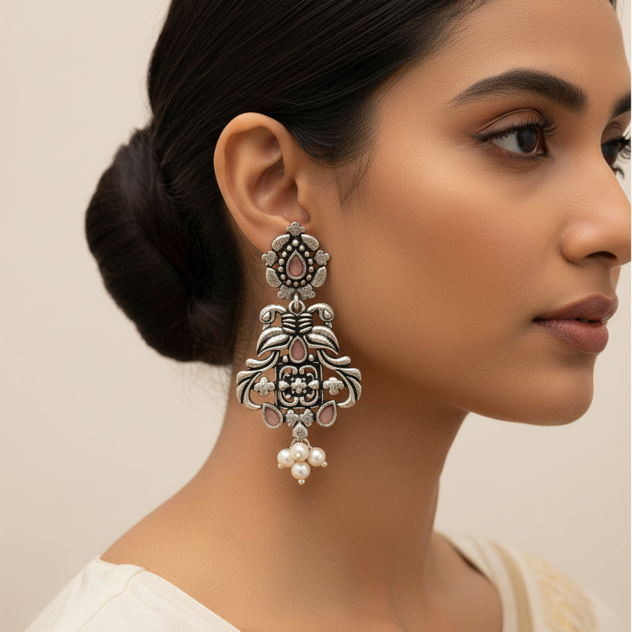 Feathered Grace dangler earrings (Light Orange)