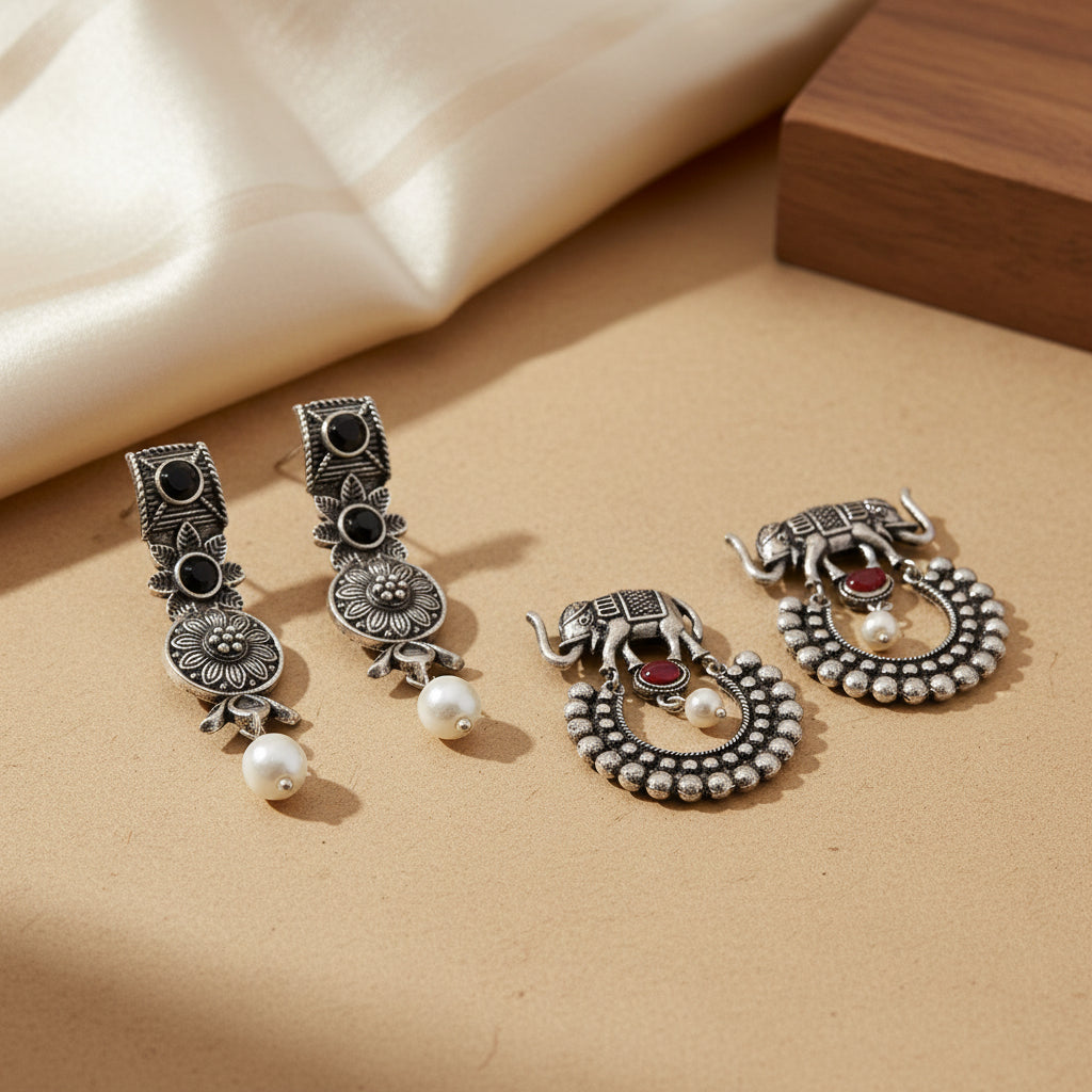 Wonderful wildflower oxidised stud earrings (Black)&Elephant Arc dangler earrings (Dark Red) Combo set