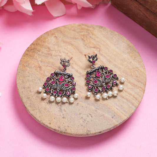 Red Stone Studded Oxidised Earrings With Hanging Pearls