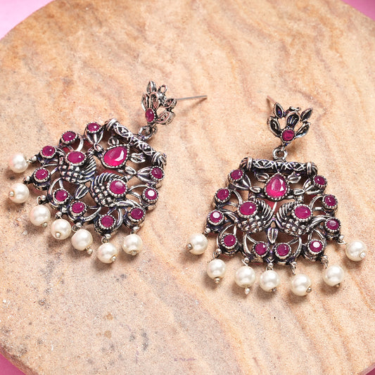 Red Stone Studded Oxidised Earrings With Hanging Pearls