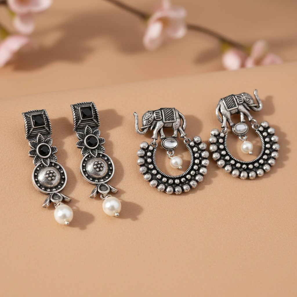 Wonderful wildflower oxidised stud earrings (Black)&Elephant Arc dangler earrings (White) Combo set