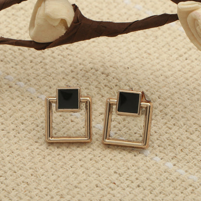 Golden Edge- Stone studded dangler earrings