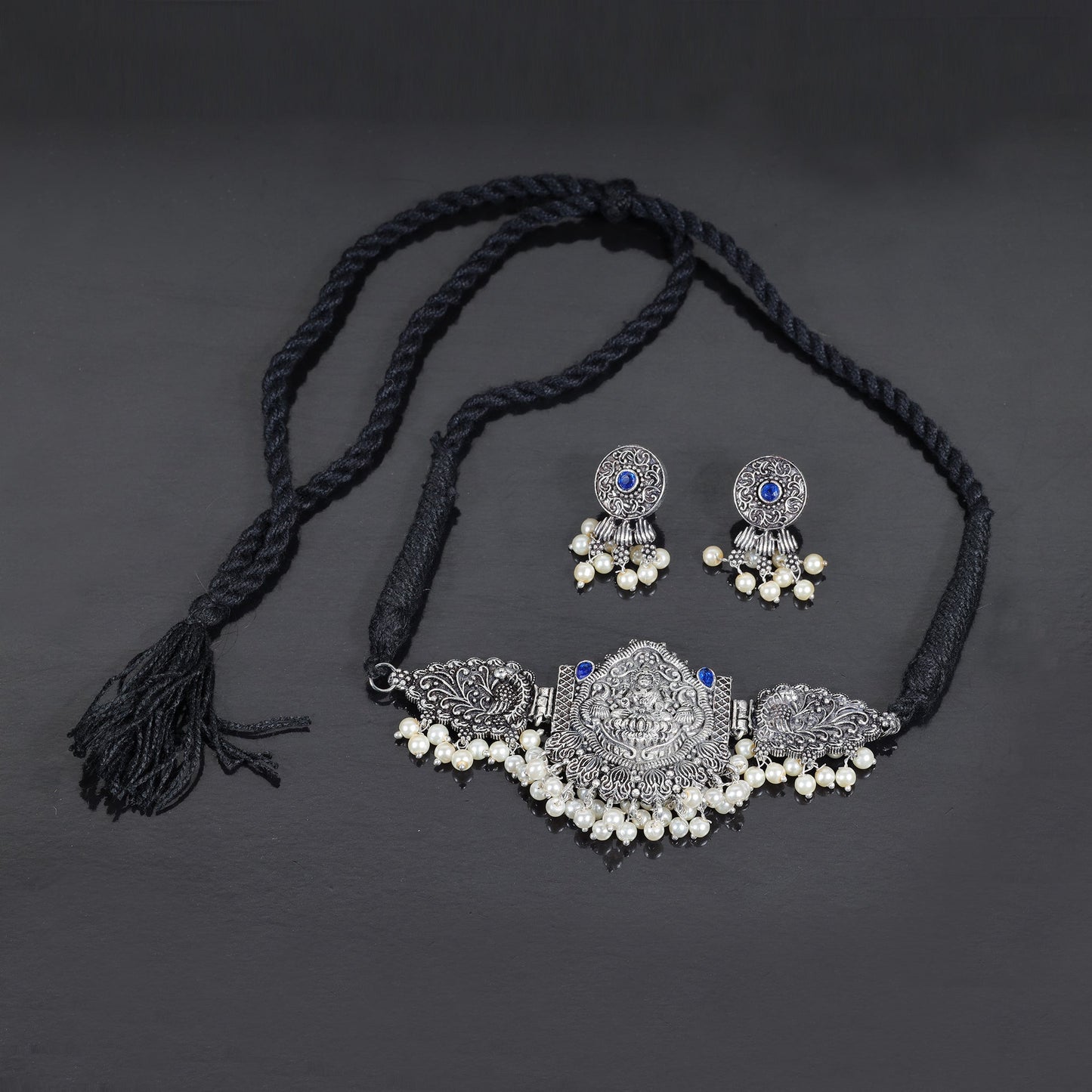 Blue Stone studded Laxmi Motif German Silver Neckpiece set