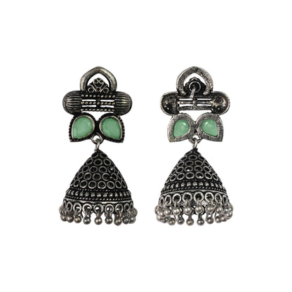 Pista Stone Studded German Silver Earrings With Brass Jhumki