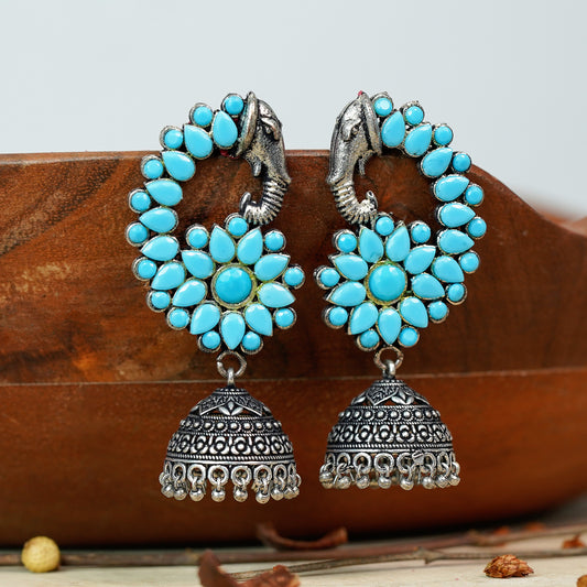 Sky Blue Stone Studded Peacock German Silver Earrings