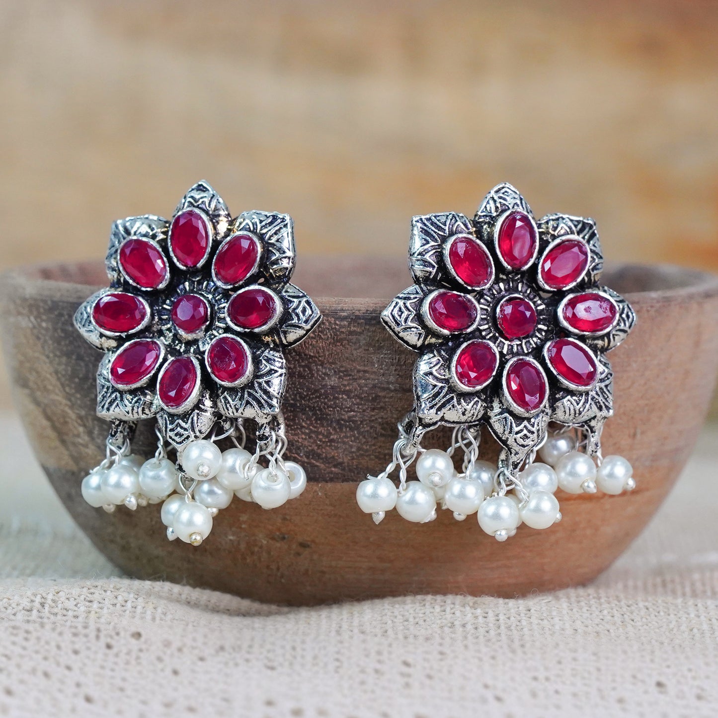 Red Stone Studded Oxidised Earrings With Hanging Pearls