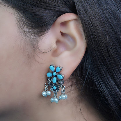 Sky Blue Stone Studded Oxidised Earrings With Hanging Pearl