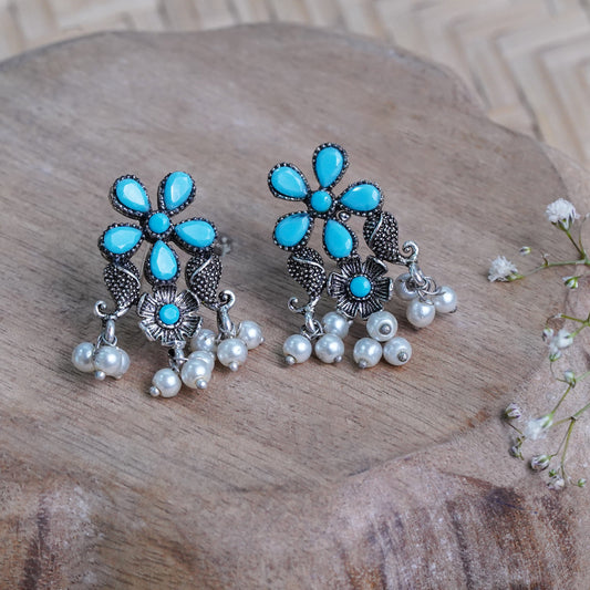 Sky Blue Stone Studded Oxidised Earrings With Hanging Pearl