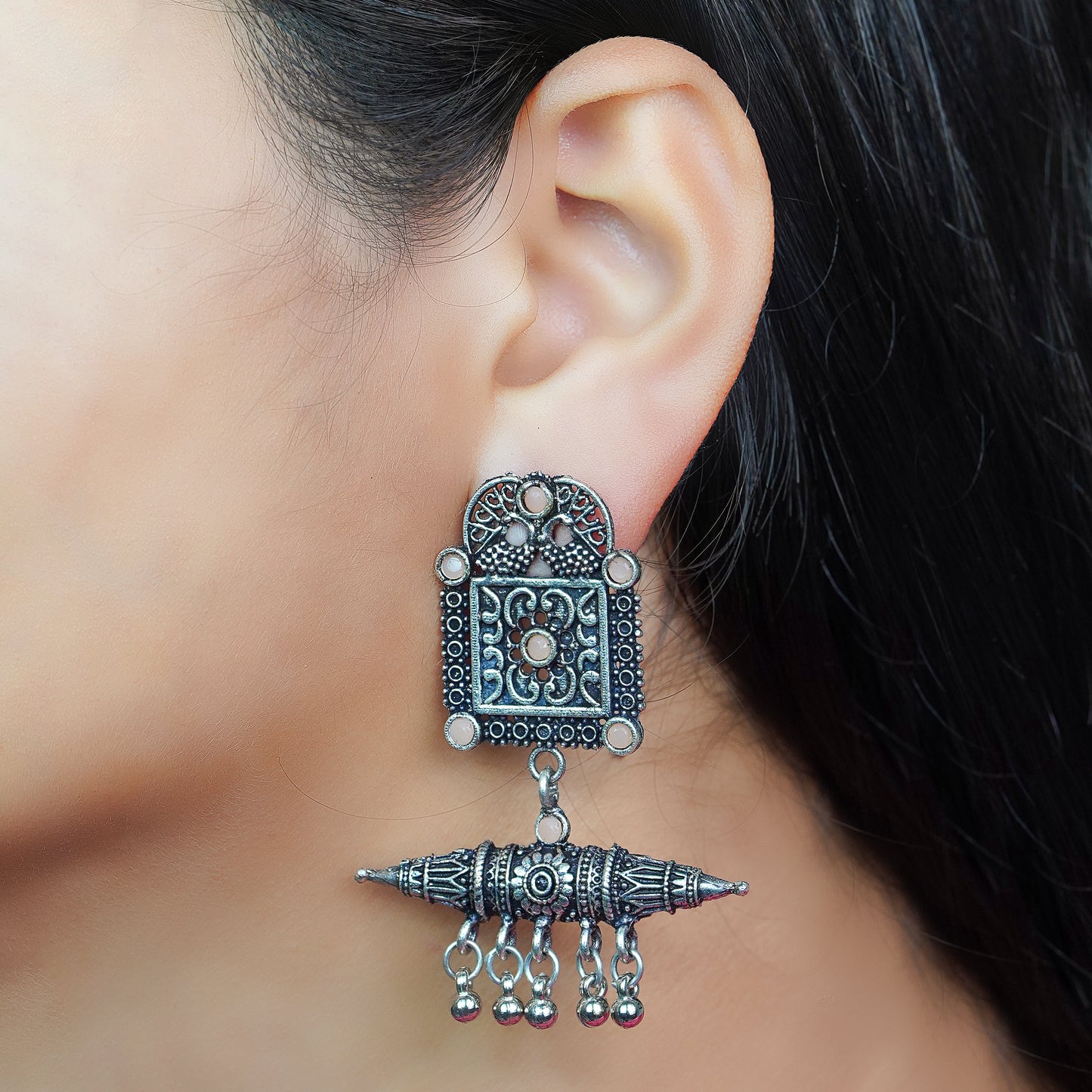 Light Orangish Stone Studded Oxidised Statement Earrings With Hanging Ghunghuroo