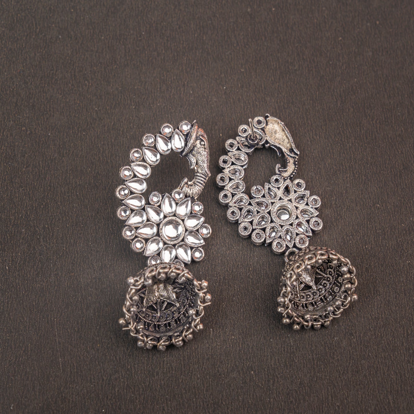 White Stone Studded Peacock German Silver Earrings