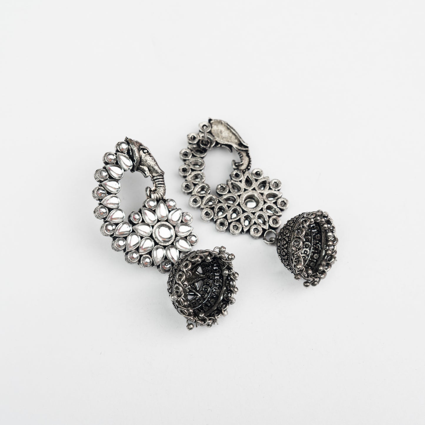 White Stone Studded Peacock German Silver Earrings