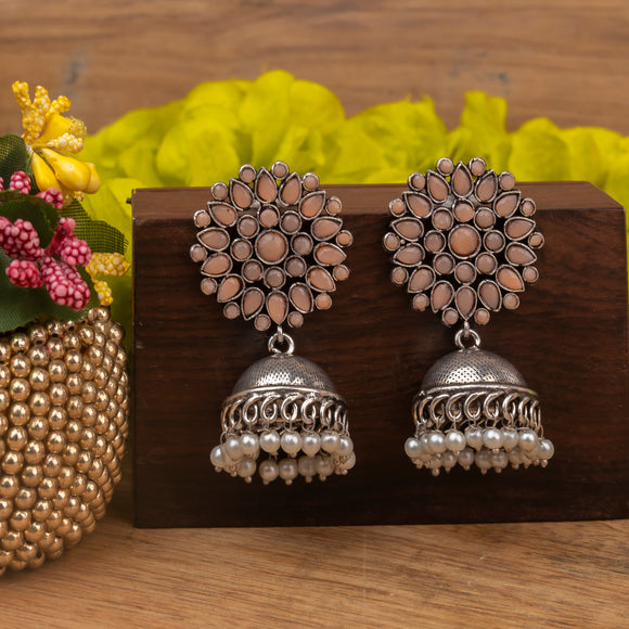Light Orangish Stone Studded German Silver Statement Earrings With Brass Jhumki