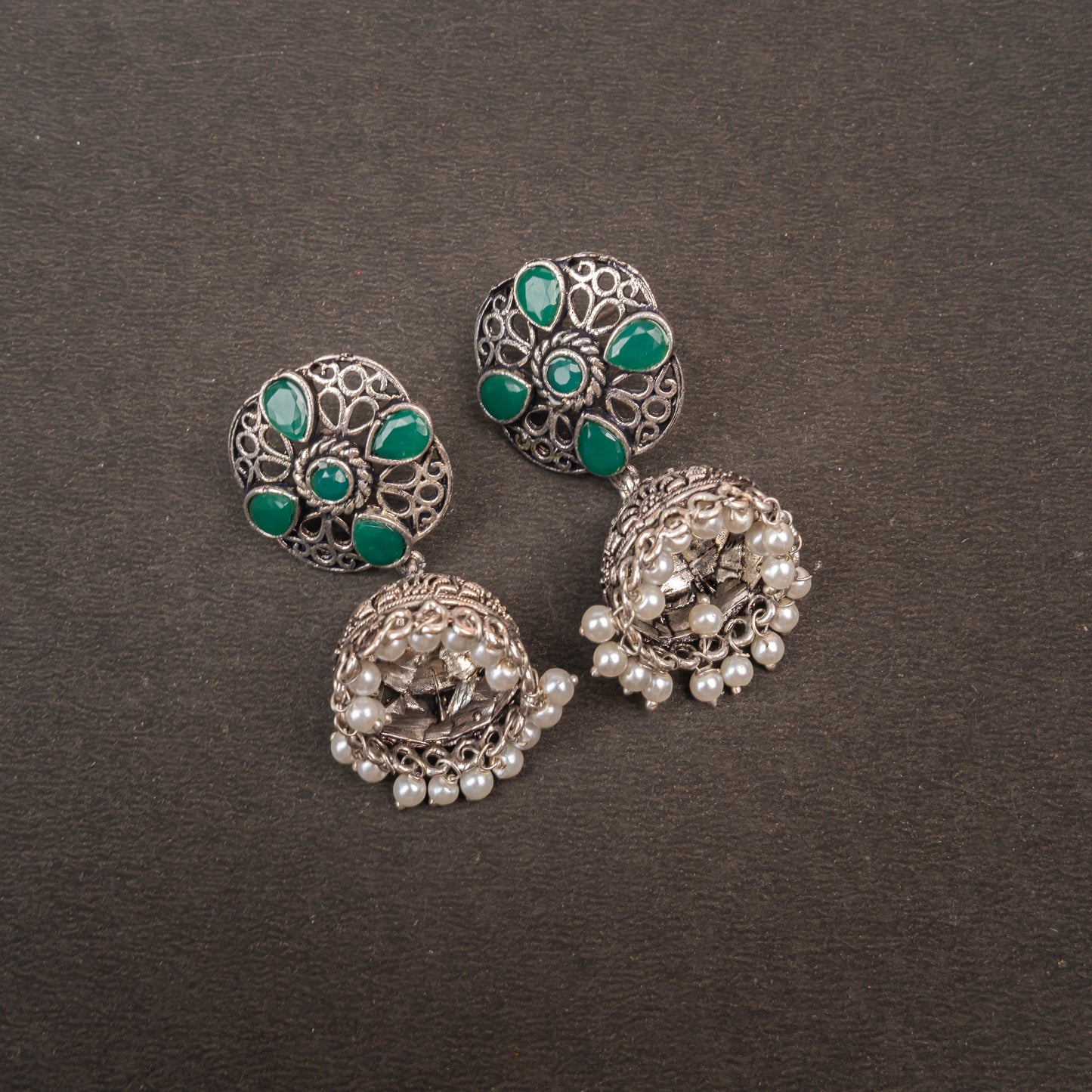 Green Stone Studded Statement Earrings With Hanging Jhumka Embellished With Baby Pearls
