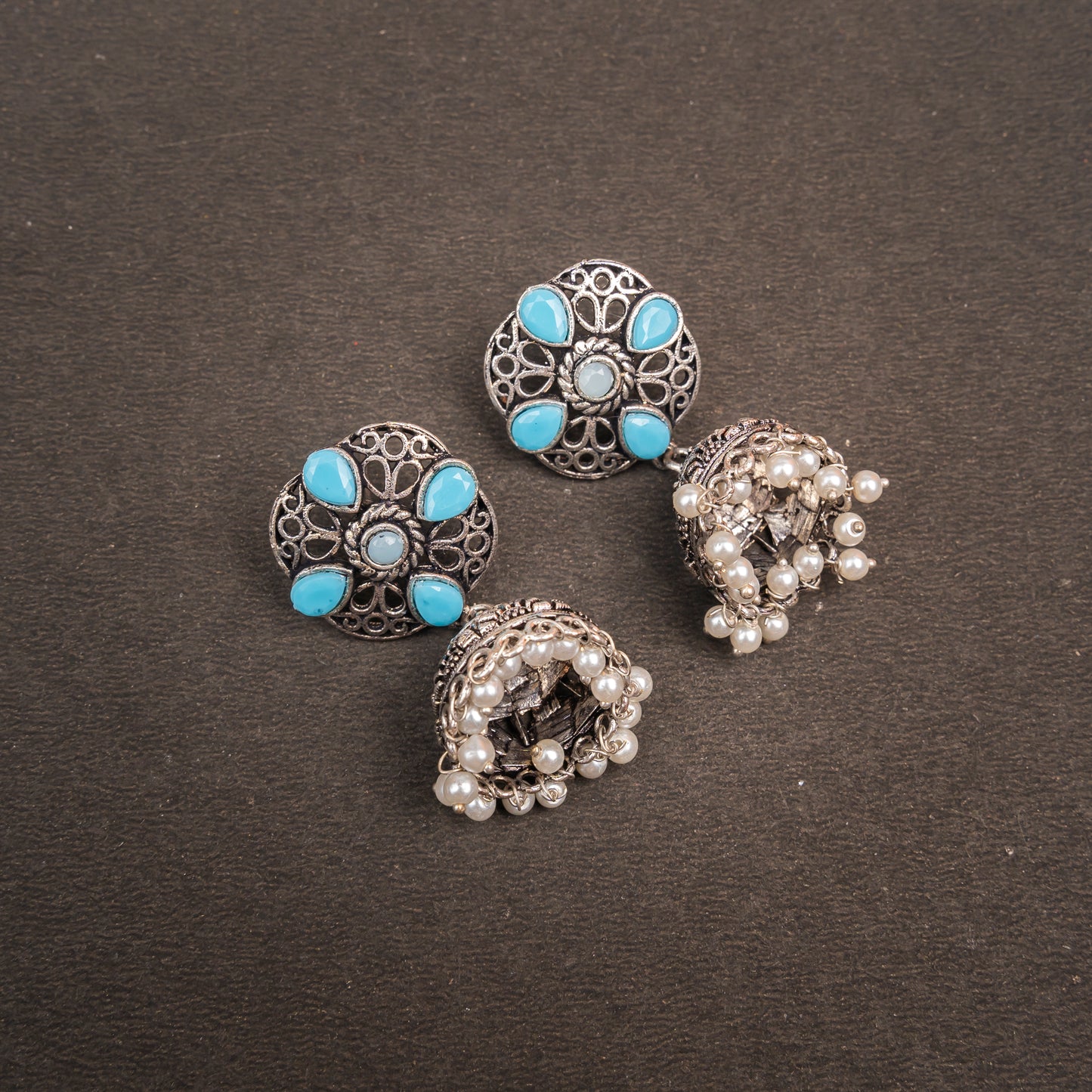 Sky Blue Stone Studded Statement Earrings With Hanging Jhumka Embellished With Baby Pearls