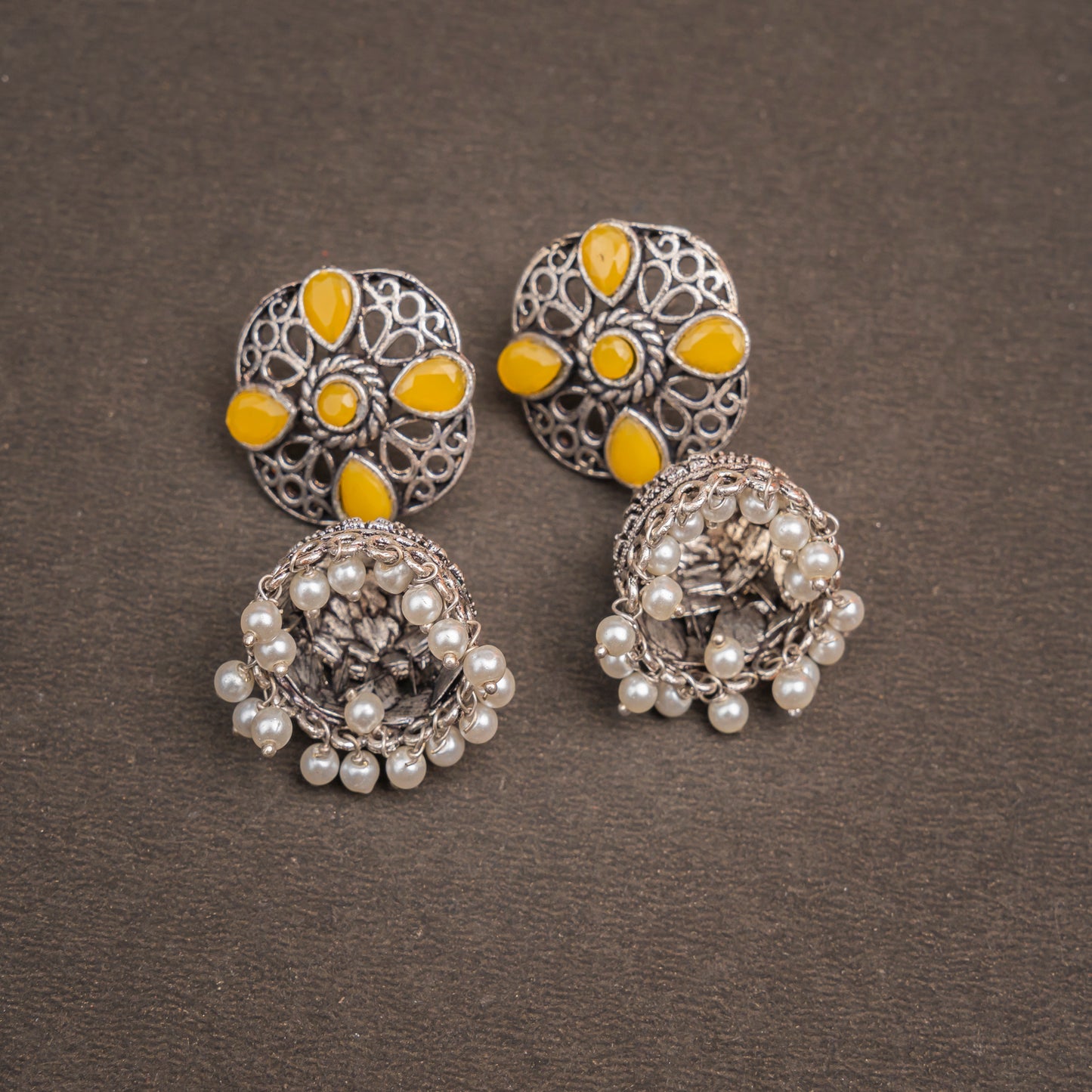 Yellow Stone Studded Statement Earrings With Hanging Jhumka Embellished With Baby Pearls