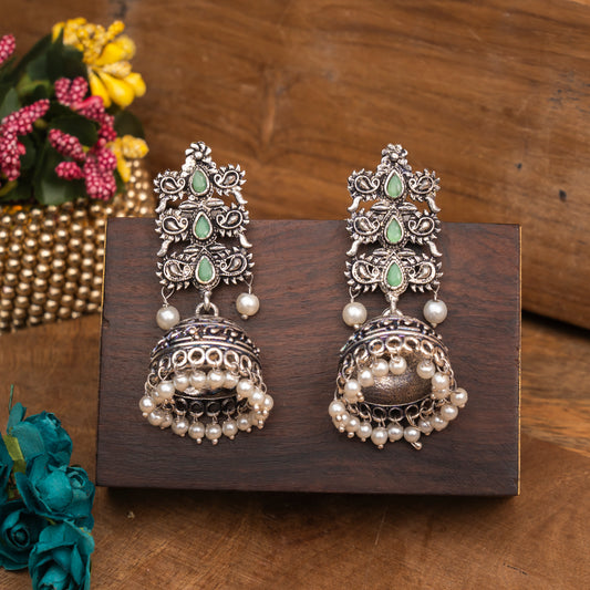 Pista Stone Studded Statement German Silver Danglers With Brass Jhumki