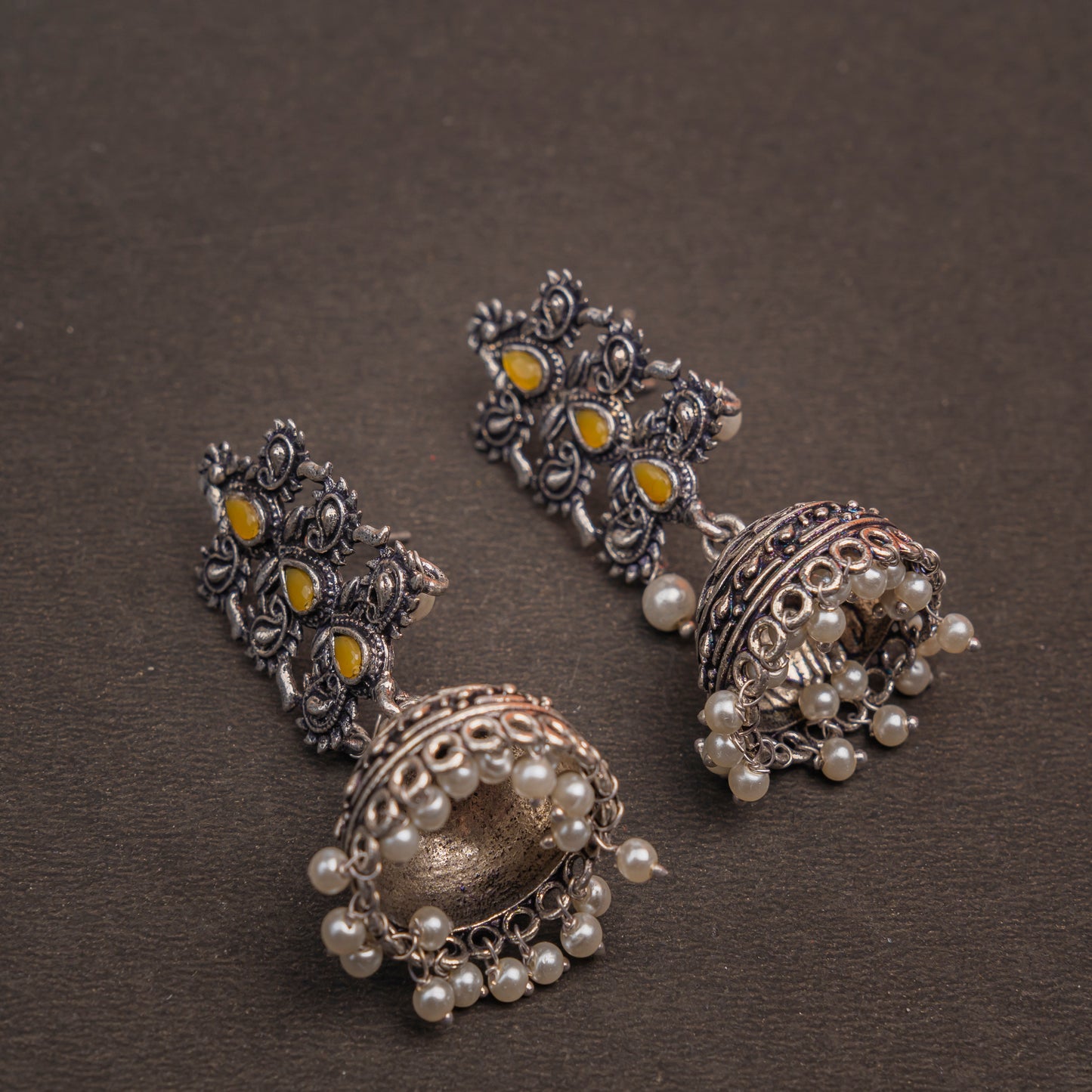 Yellow Stone Studded Statement German Silver Danglers With Brass Jhumki
