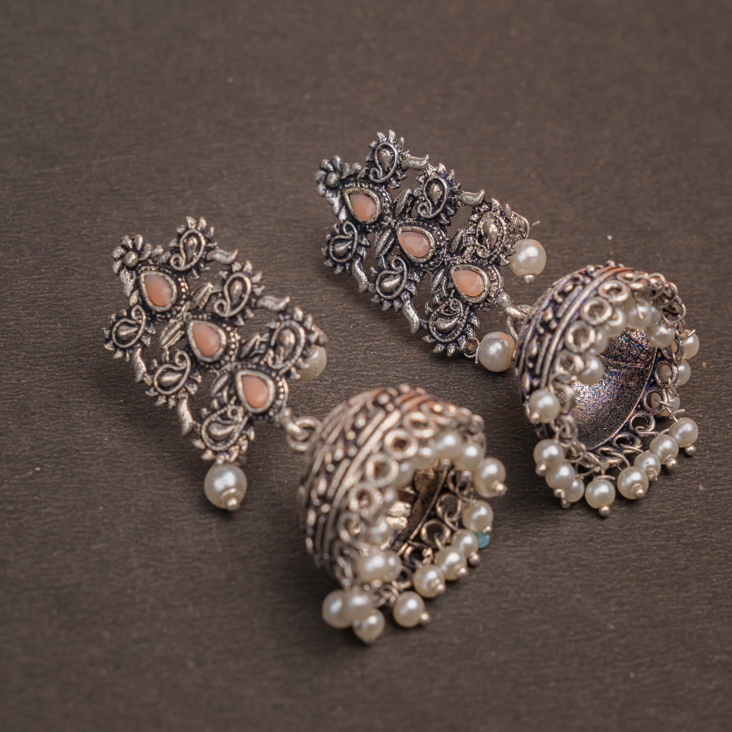 Light Orangish Stone Studded Statement German Silver Danglers With Brass Jhumki