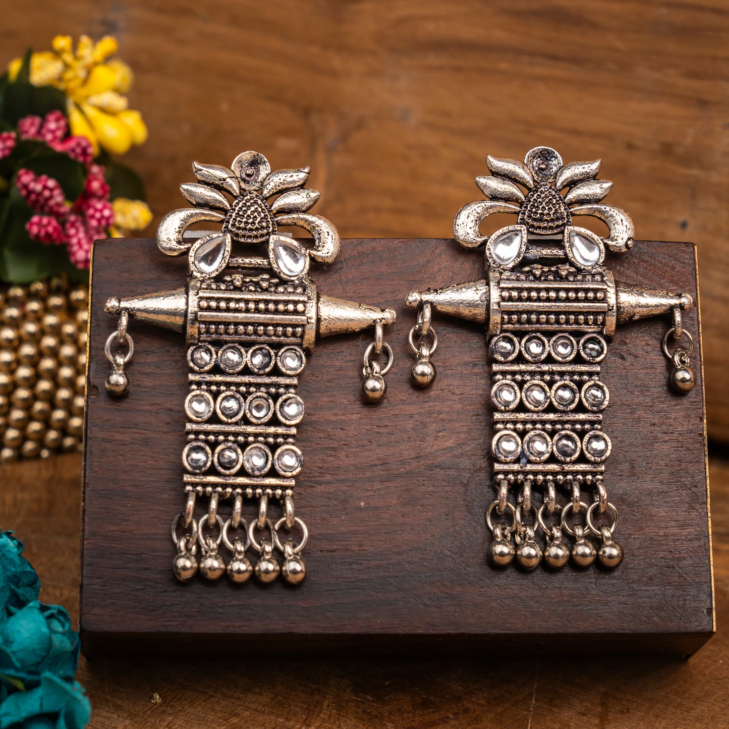 White Stone Studded Oxidised Earrings With Hanging Ghunghuroo