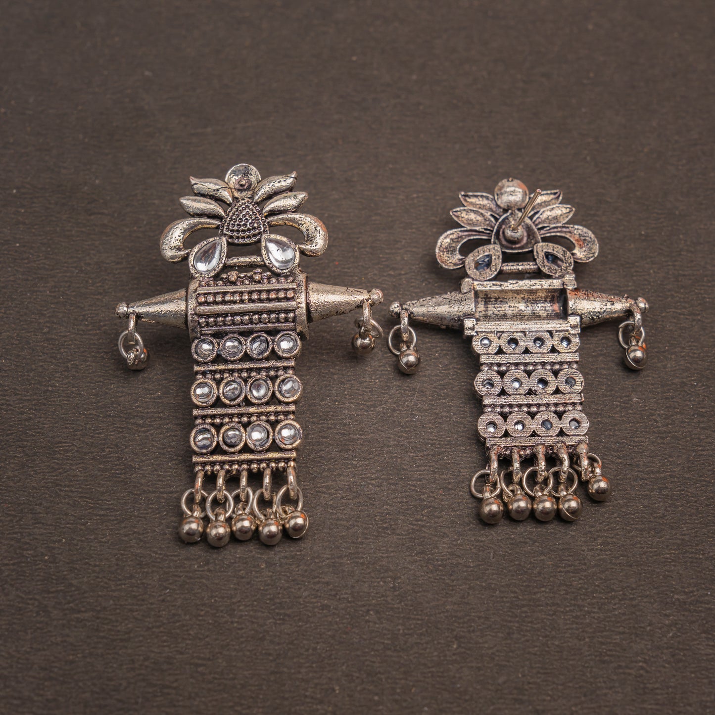 White Stone Studded Oxidised Earrings With Hanging Ghunghuroo