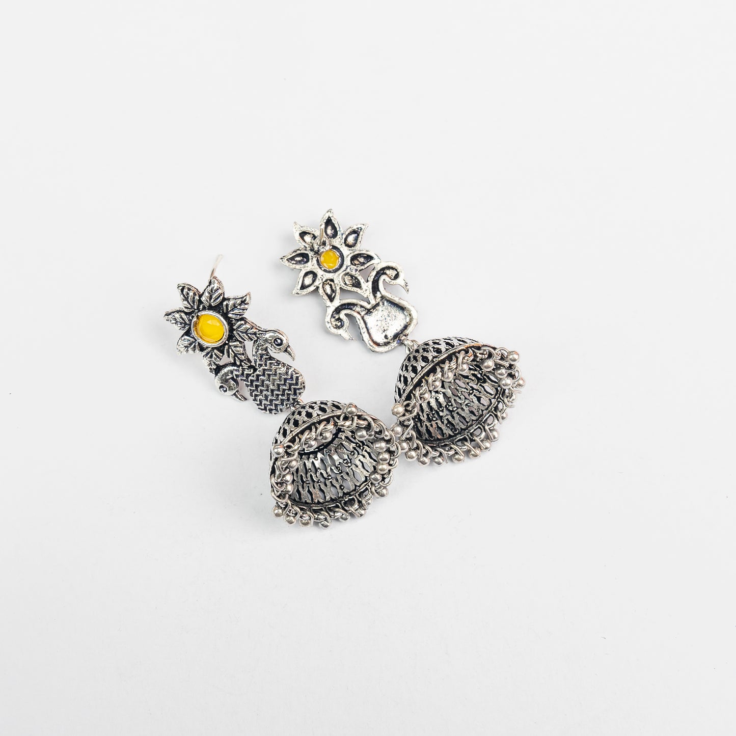 Yellow Stone Studded Intricate Danglers With Hanging Jhumki