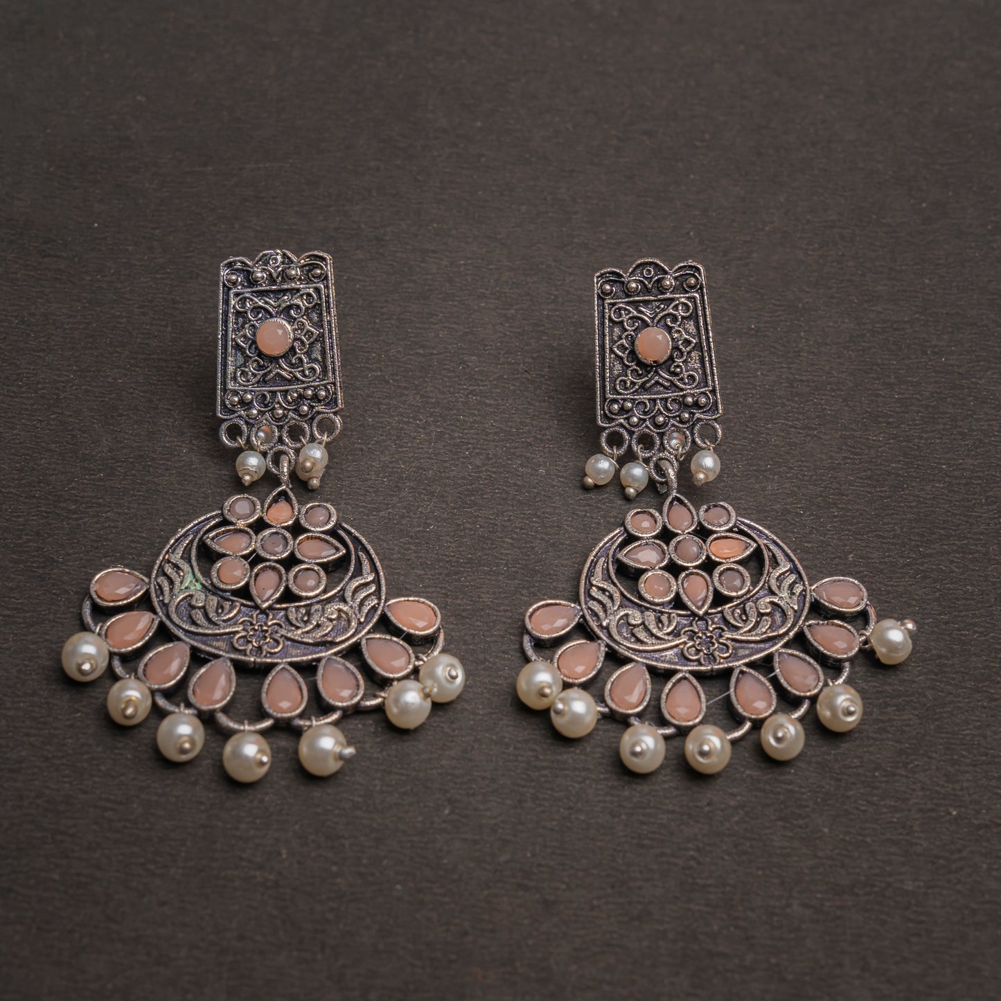 Light Orangish Stone Studded Statement Dangler Earrings