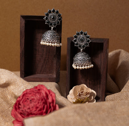 Black Stone Studded German Silver Jhumki Earrings With Hanging Pearls