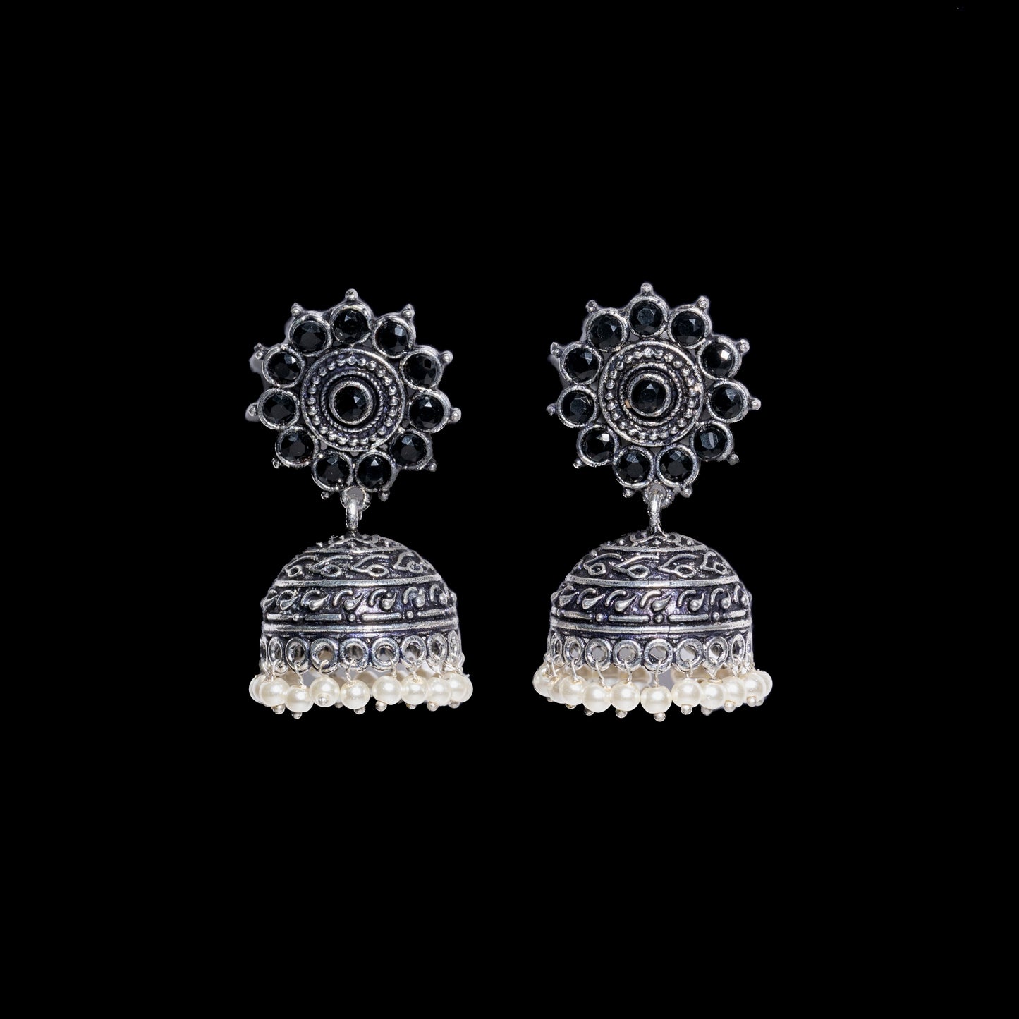 Black Stone Studded German Silver Jhumki Earrings With Hanging Pearls