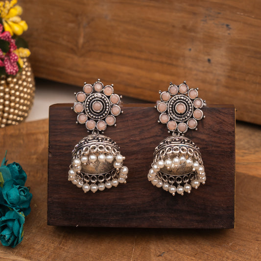 Light Orangish Stone Studded German Silver Jhumki Earrings With Hanging Pearls