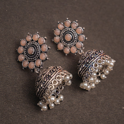 Light Orangish Stone Studded German Silver Jhumki Earrings With Hanging Pearls