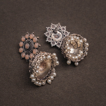 Light Orangish Stone Studded German Silver Jhumki Earrings With Hanging Pearls