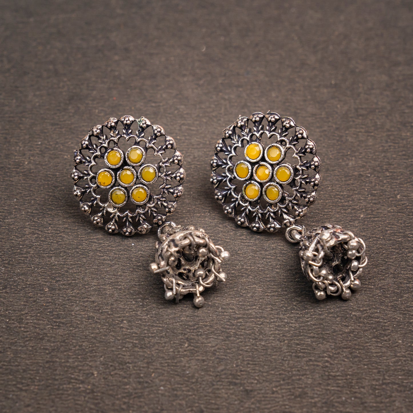 Yellow Stone Studded Oxidised Earrings With Hanging Jhumki