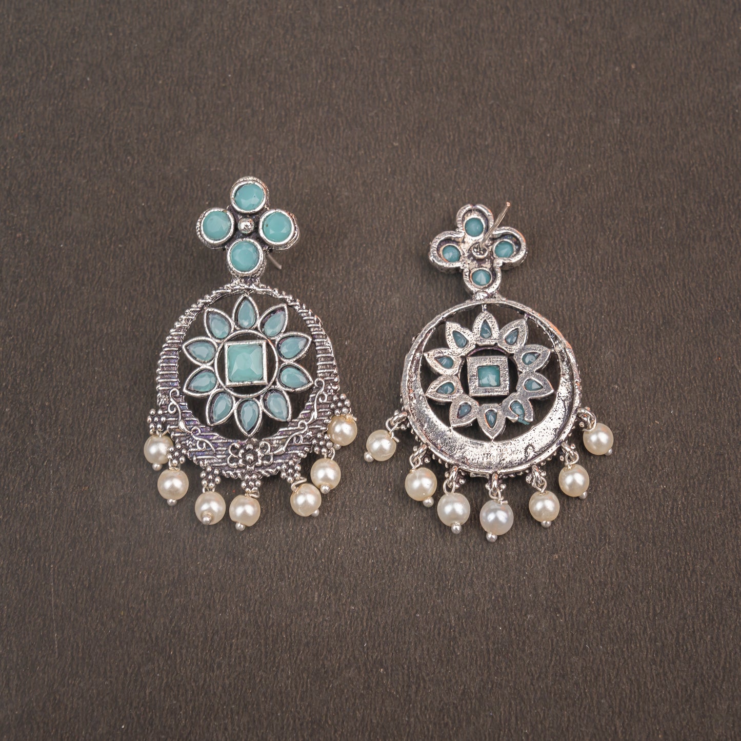 Mint Stone Studded German Silver Stud Earrings With Hanging Pearls