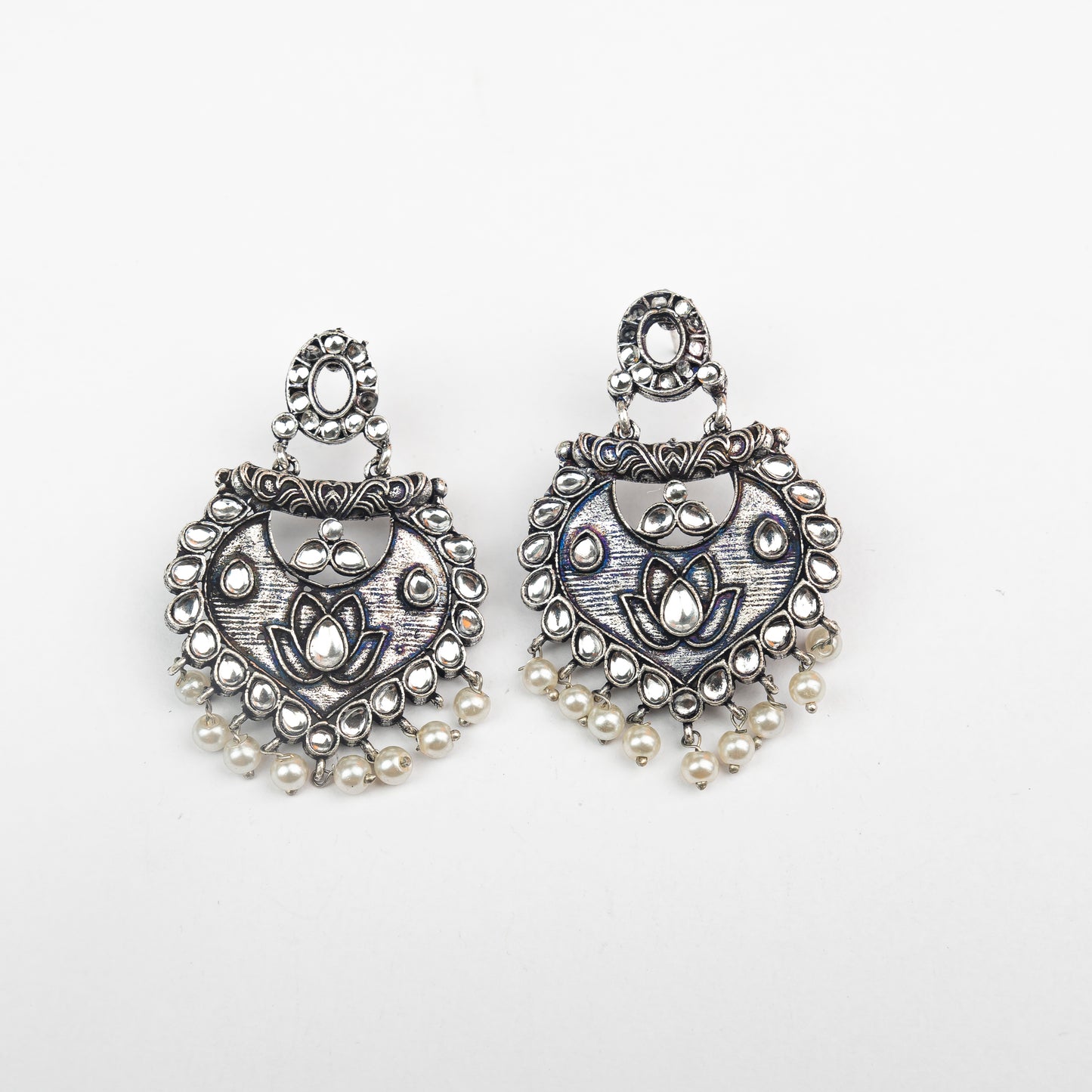 White Stone Studded Oxidised Earrings With Hanging Pearls