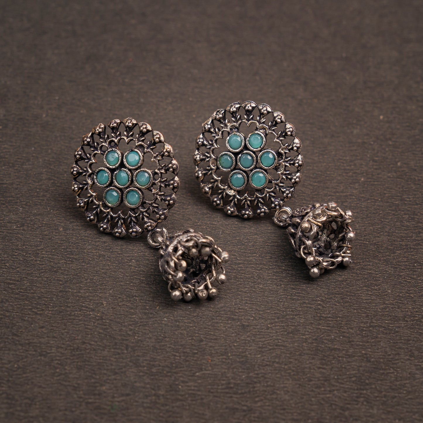 Pista Stone Studded Oxidised Earrings With Hanging Jhumki