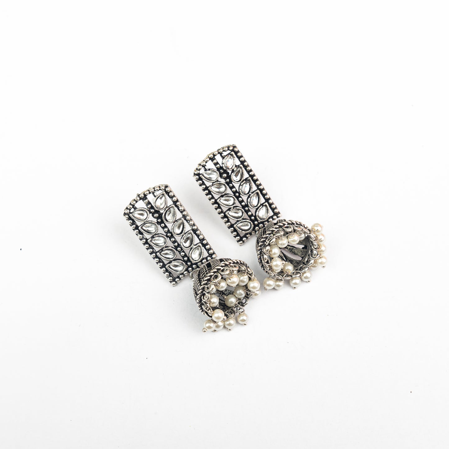 White Stone Studded German Silver Statement Earrings With Brass Jhumki