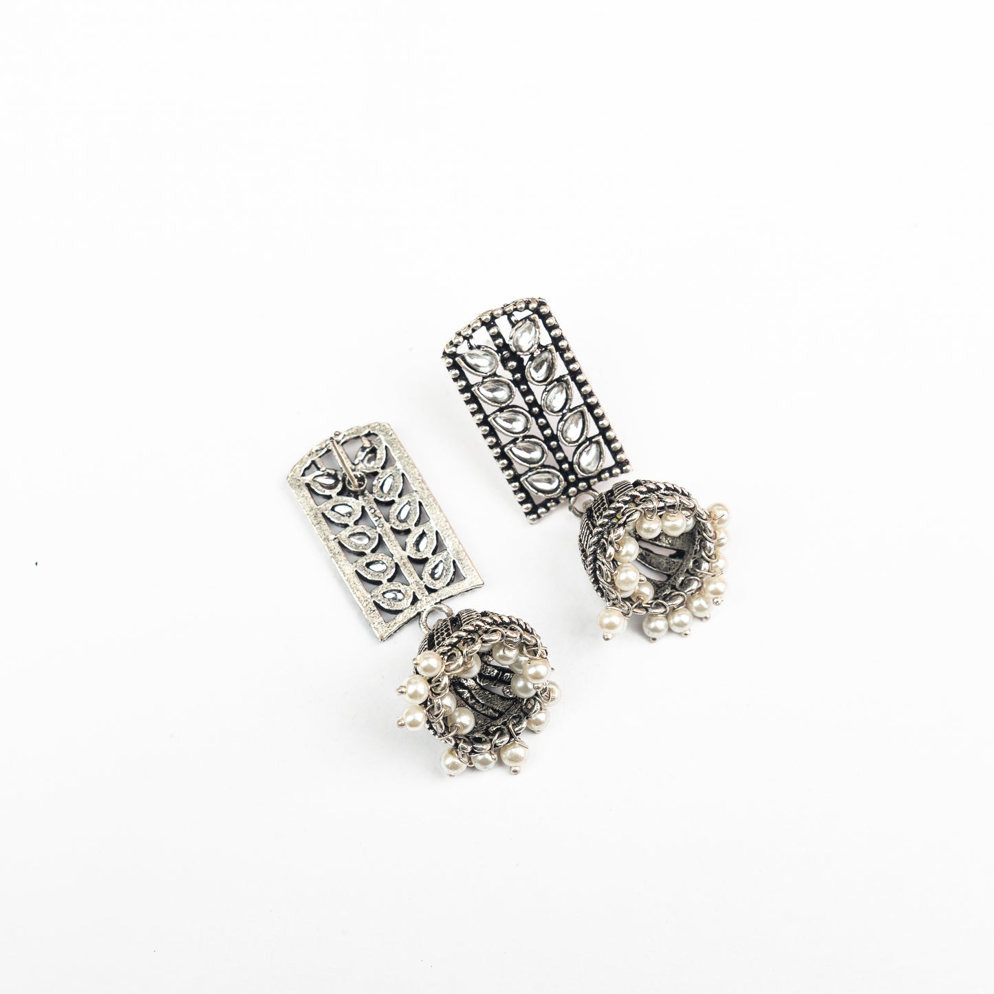 White Stone Studded German Silver Statement Earrings With Brass Jhumki
