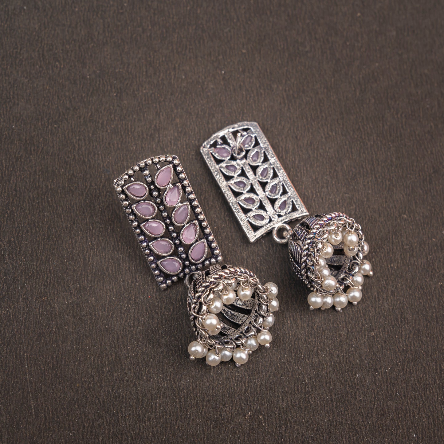 Baby Pink Stone Studded German Silver Statement Earrings With Brass Jhumki