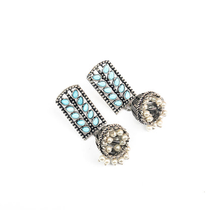 Sky Blue Stone Studded German Silver Statement Earrings With Brass Jhumki